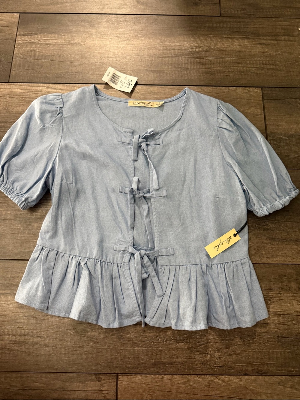 Liberty Love Light Blue Tie-Front Peplum Top